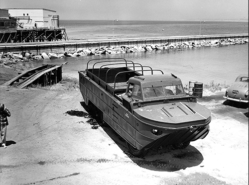 XM-147 Amphibious Truck “SuperDUKW” shown on the shoreline.
