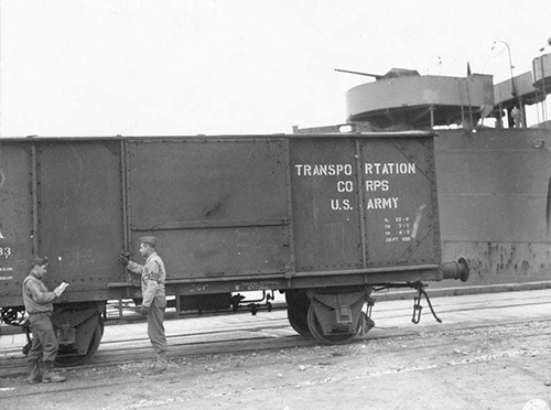 European Service Box Car in a port during World War II.