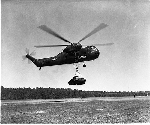 CH-37 Mojave airlifting cargo.