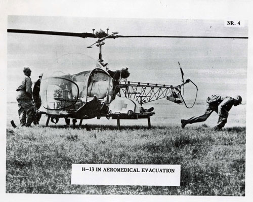 The H-13 Sioux being loaded.
