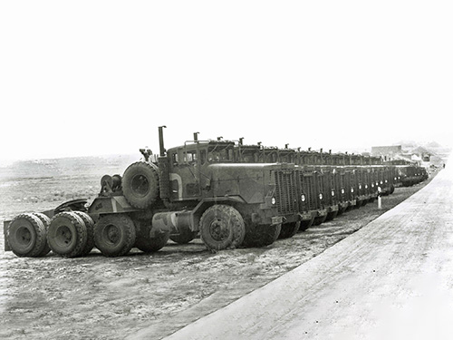 M911 tractors in line.